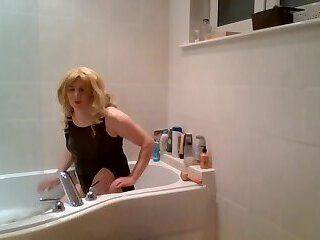 Black lacy gown in the bath - ashemaletube.com