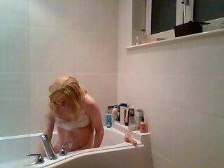 Taking a hot soapy bath in pink knickers and lacy bra - ashemaletube.com